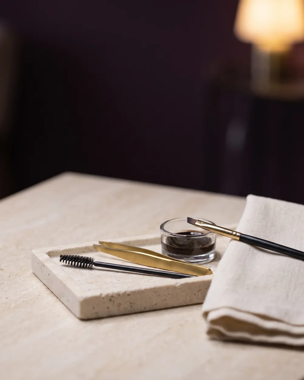 Brow tools laid out on a stone tray